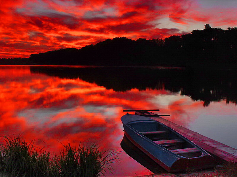 Canoe on Lake at Sunset — Red
