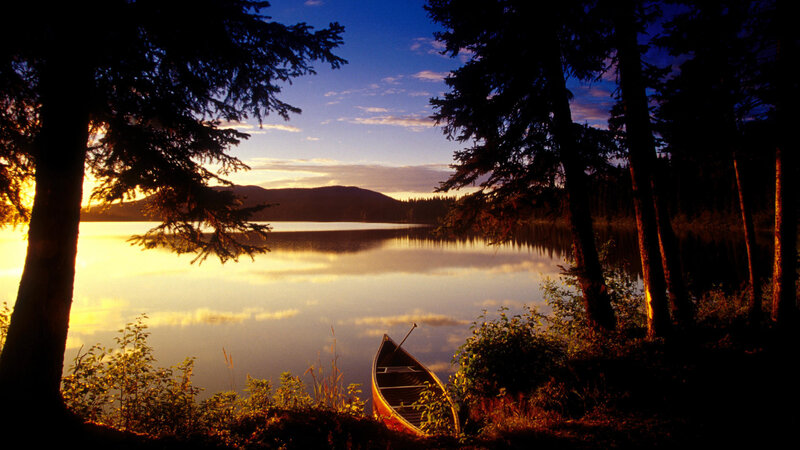 Canoe on Lake Shore — Blue, Serene, Sunset