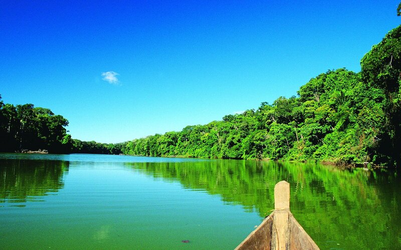 Canoe on River — Blue