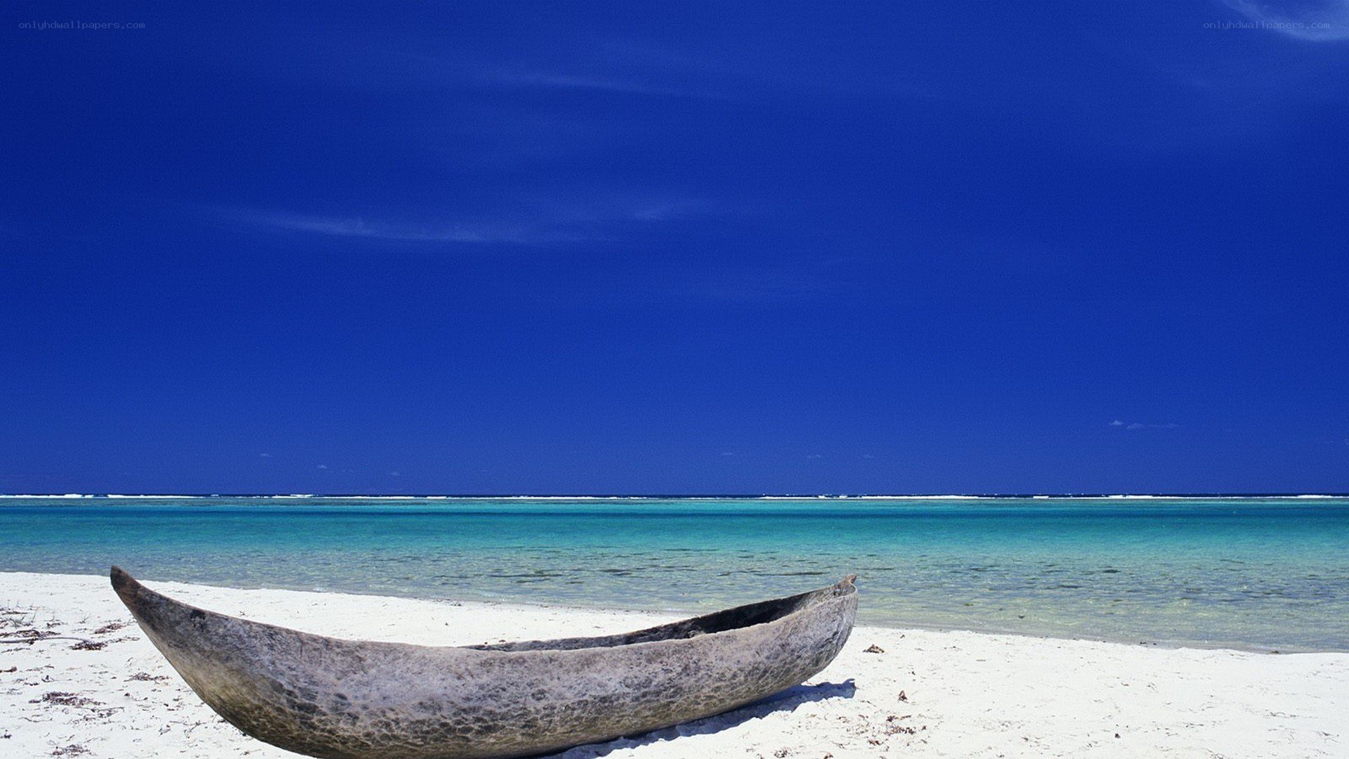Canoe on tropical beach