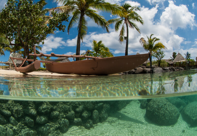 Canoe on Tropical Beach — Blue, Serene