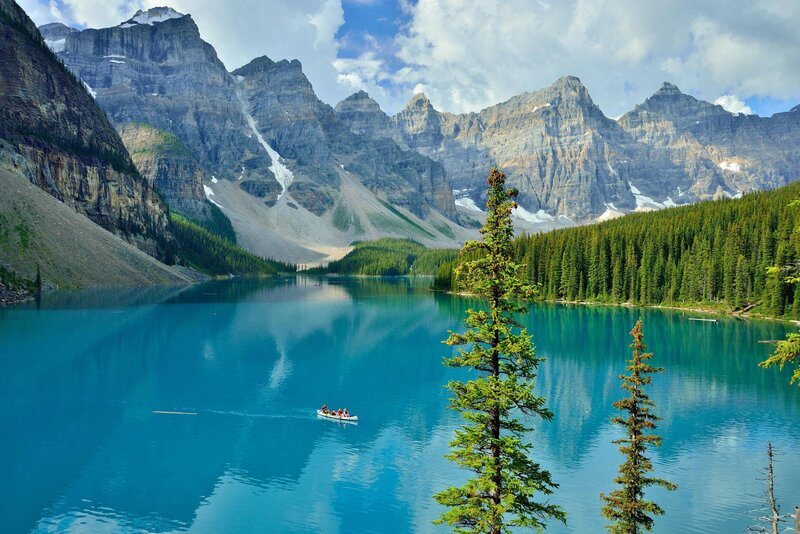 Canoe on Turquoise Lake — Blue, Serene, Afternoon, Photograph, Mountains