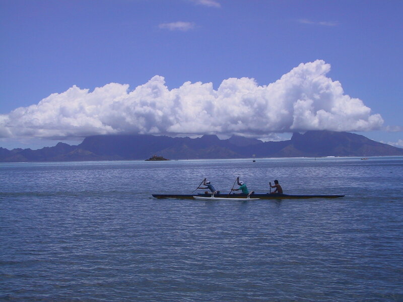 Canoeing near a mountainous island