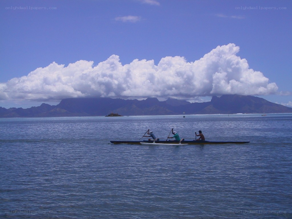 Canoeing near a mountainous island