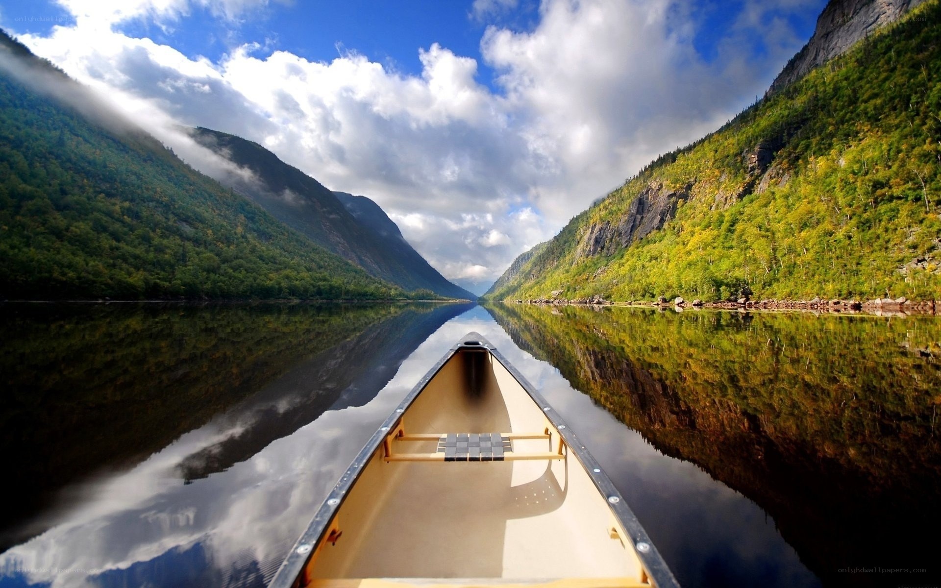 Canoeing through a mountain lake