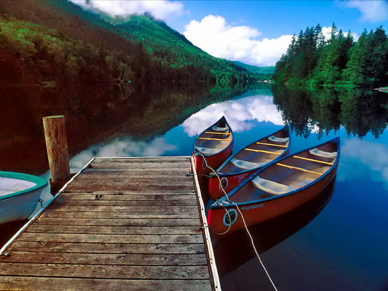 Canoes at a Lake Dock — Blue