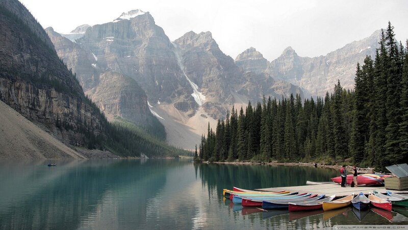 Canoes at Mountain Lake — Green, Serene