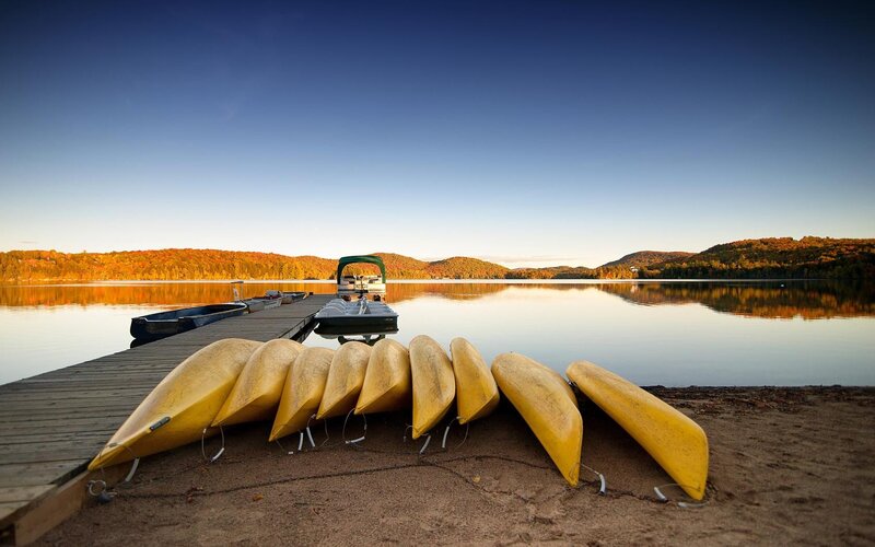 Canoes on a lake dock
