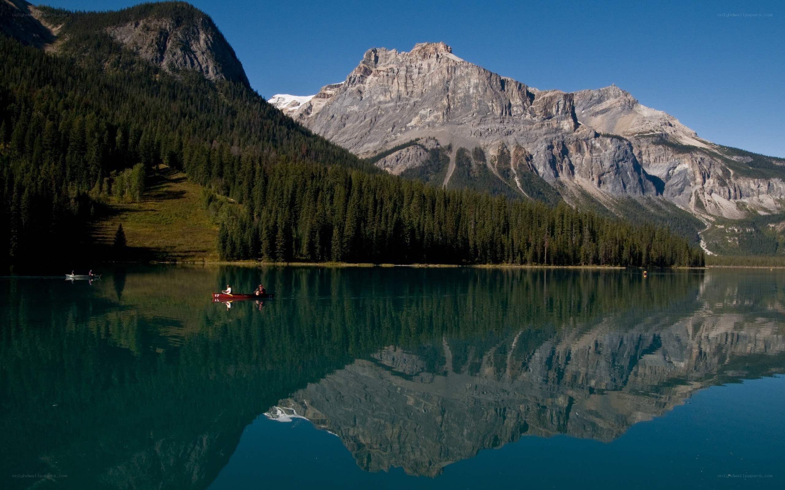 Canoes on a mountain lake