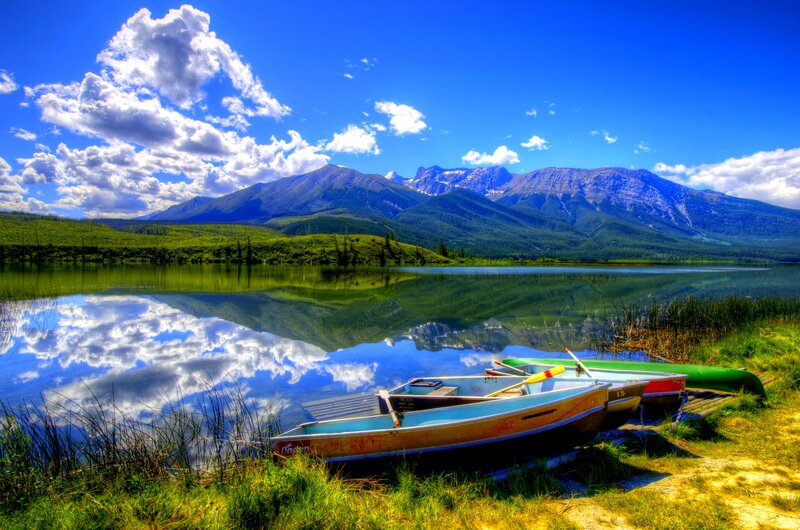 Canoes on Lake Shore — Blue, Serene
