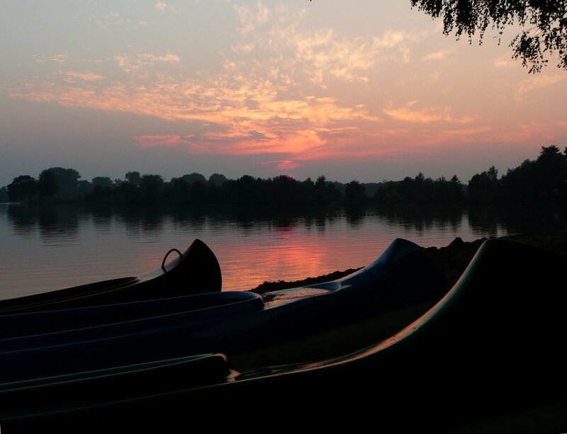 Canoes on Lake Shore — Orange