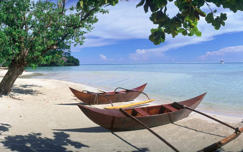 Canoes on Tropical Beach — Blue, Serene, Afternoon, Photograph