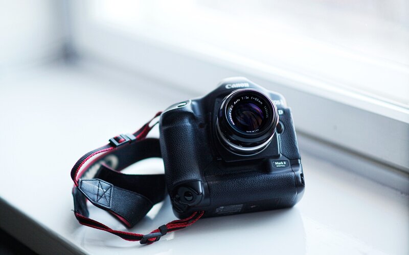 Canon camera on windowsill