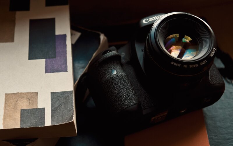 Canon camera with art book