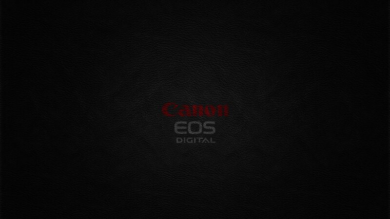 Canon EOS Digital logo on black leather
