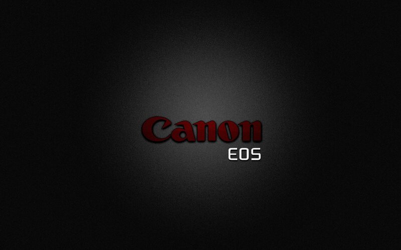 Canon EOS logo on dark background