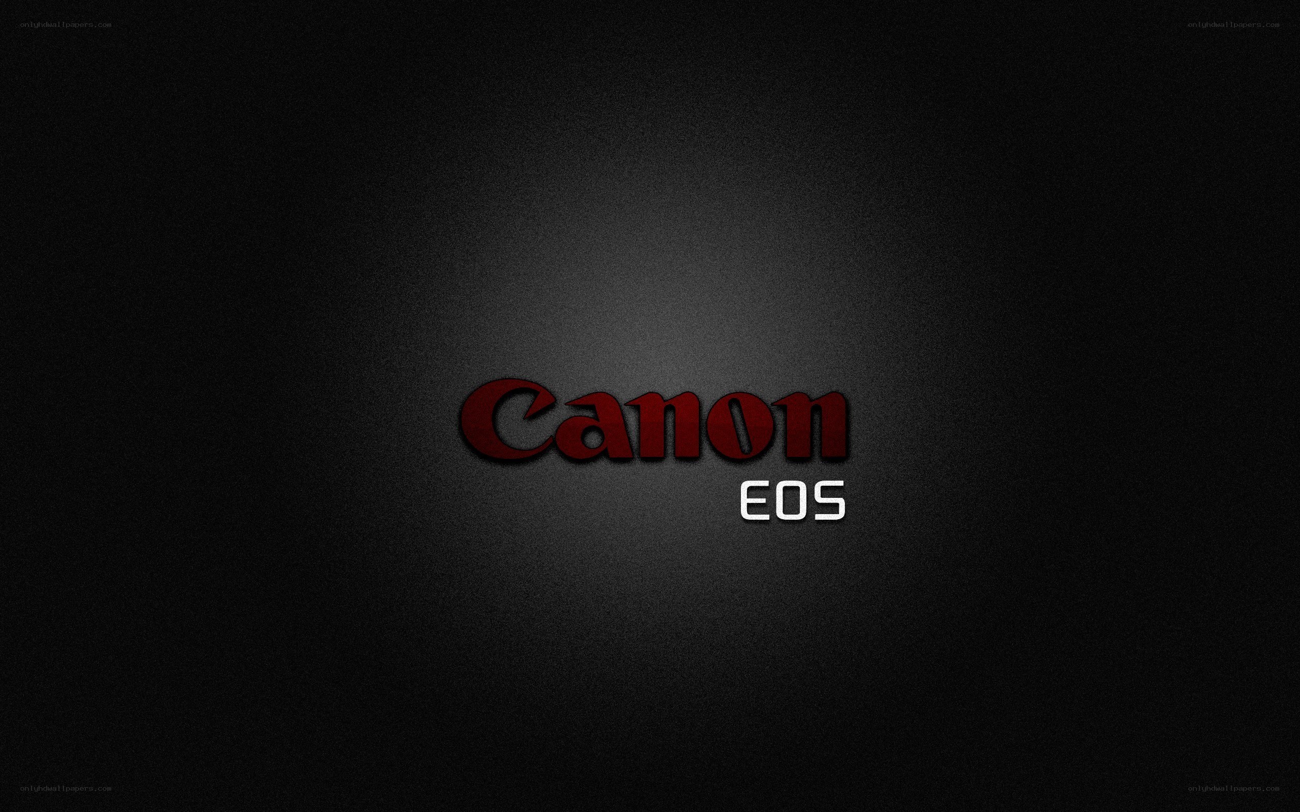 Canon EOS logo on dark background