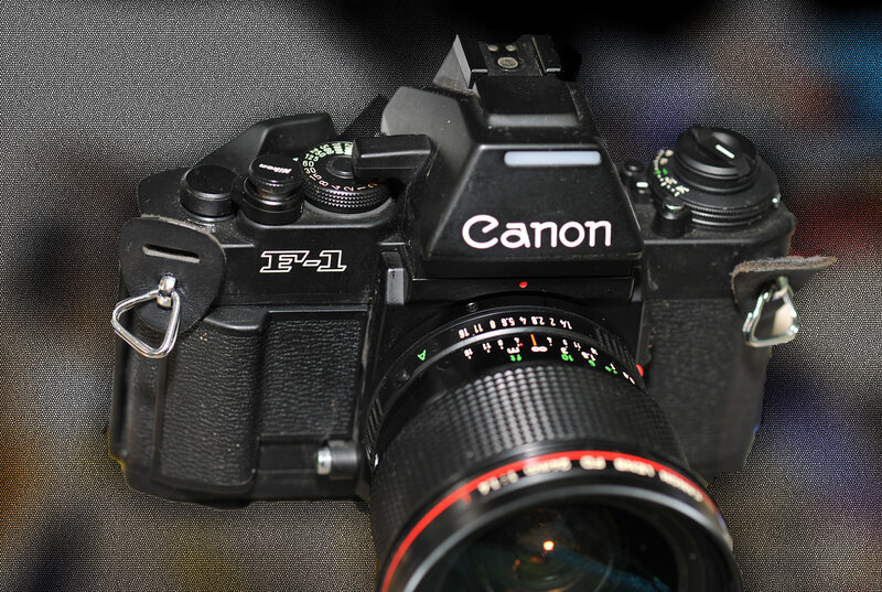 Canon F-1 camera with lens