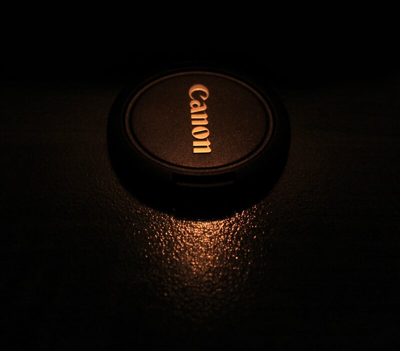 Canon lens cap in dim light
