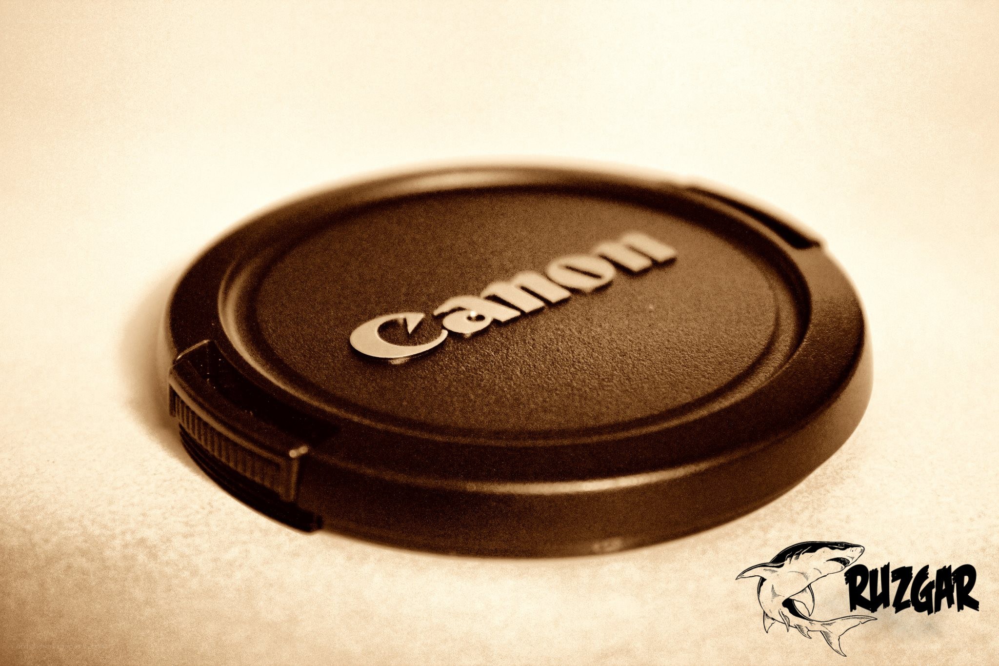 Canon lens cap with watermark