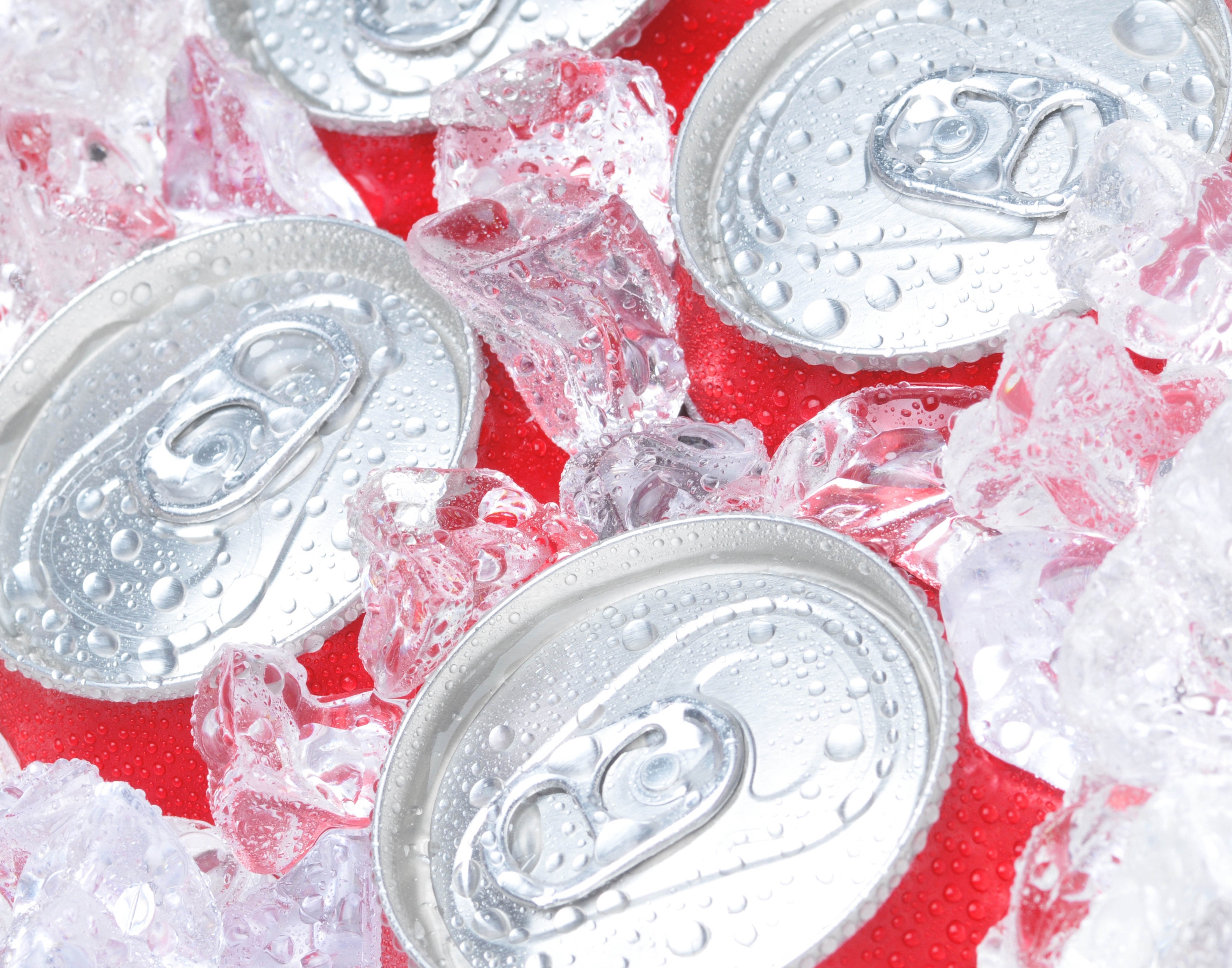 Cans with ice cubes