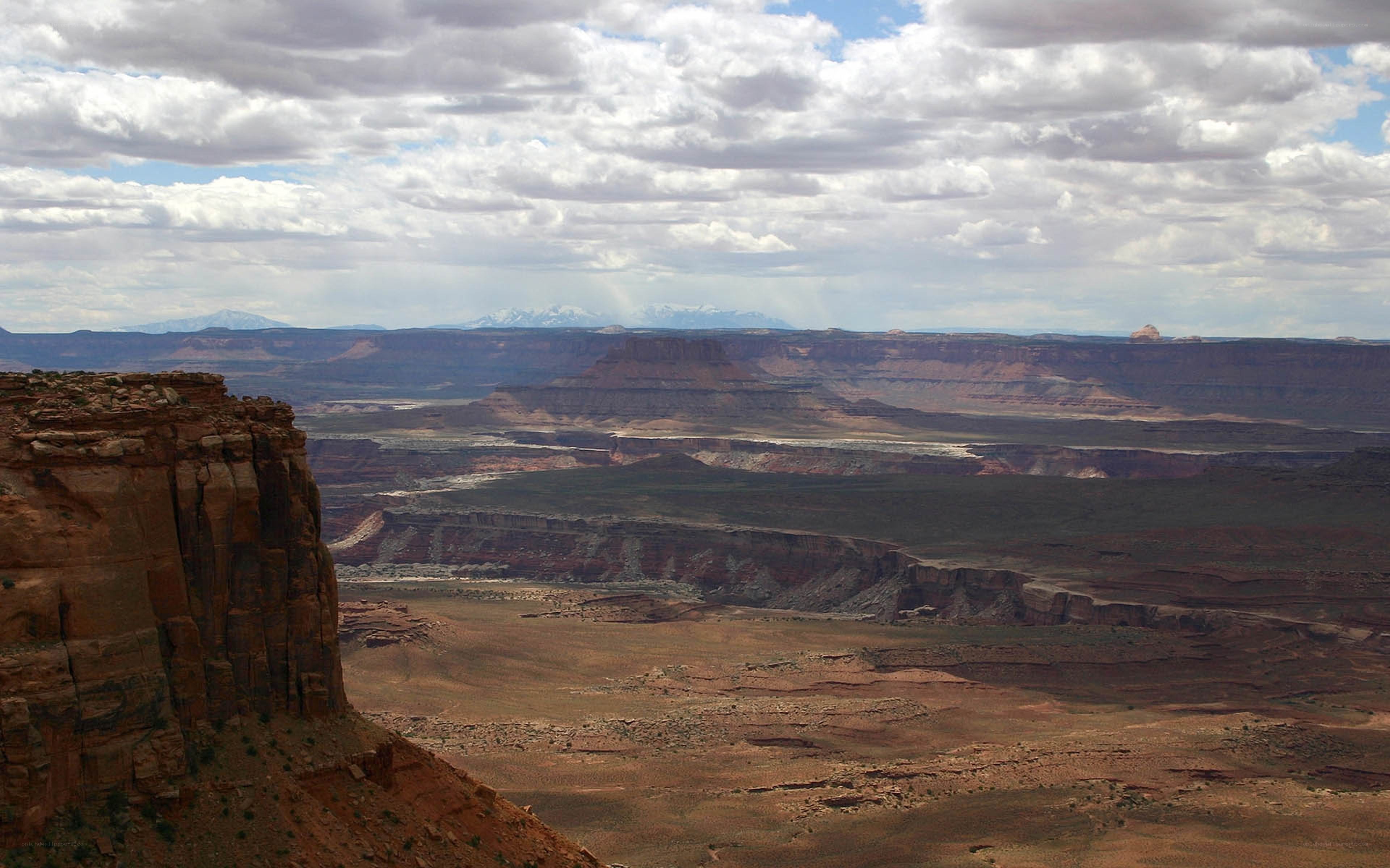 canyon landscape with distant mountains
