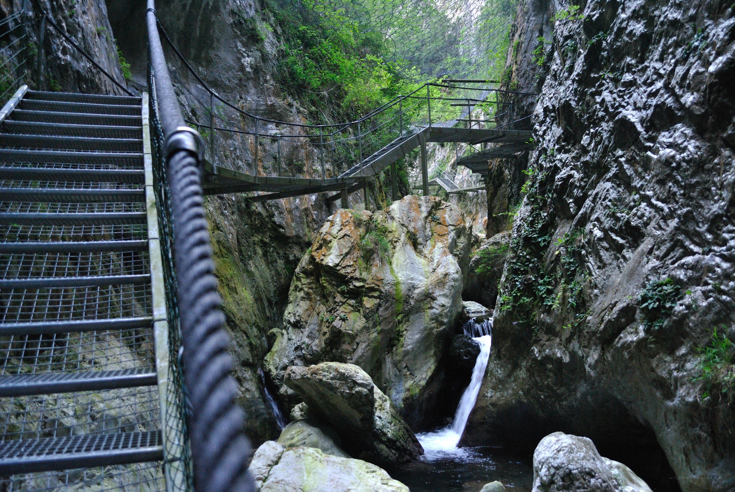 Canyon walkway with waterfall
