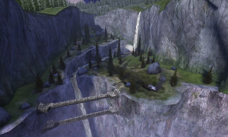 canyon with waterfall and bridge