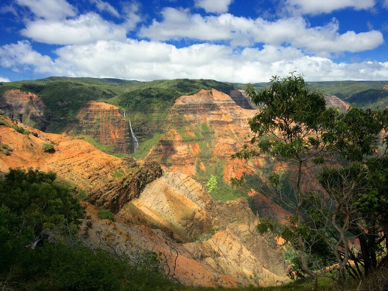 Canyon with waterfalls and green hills