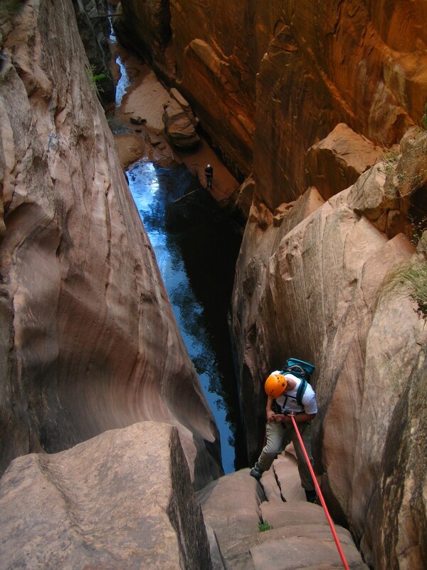 Canyoneering in a narrow canyon