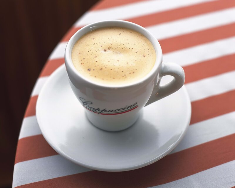 Cappuccino on striped table