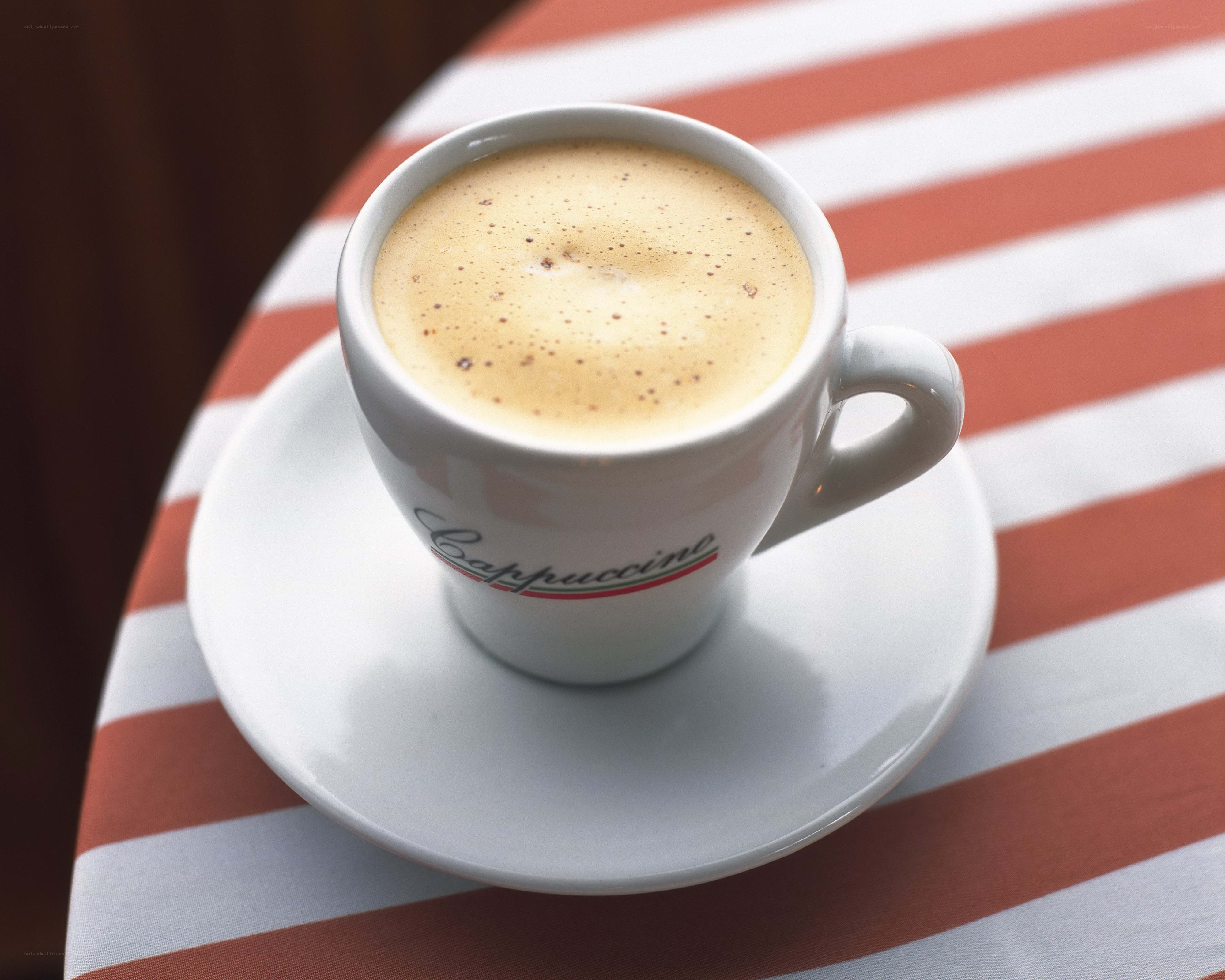 Cappuccino on striped table