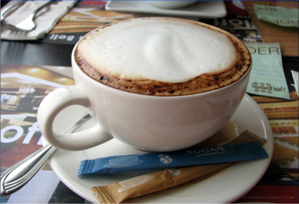 Cappuccino with sugar packets