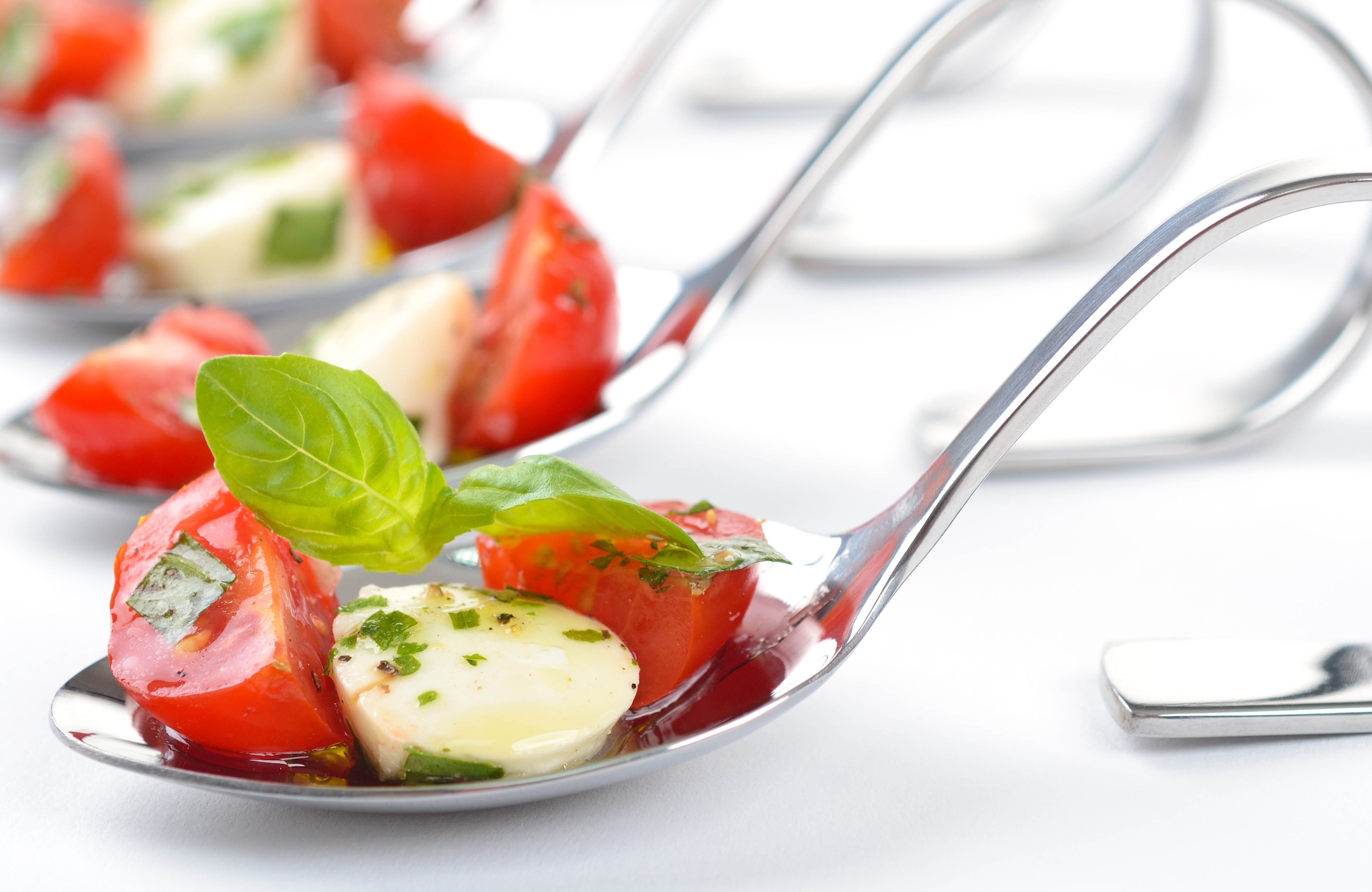 Caprese salad on a spoon