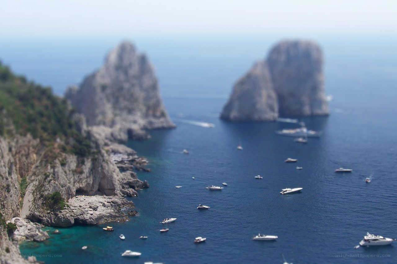 Capri sea rocks with boats