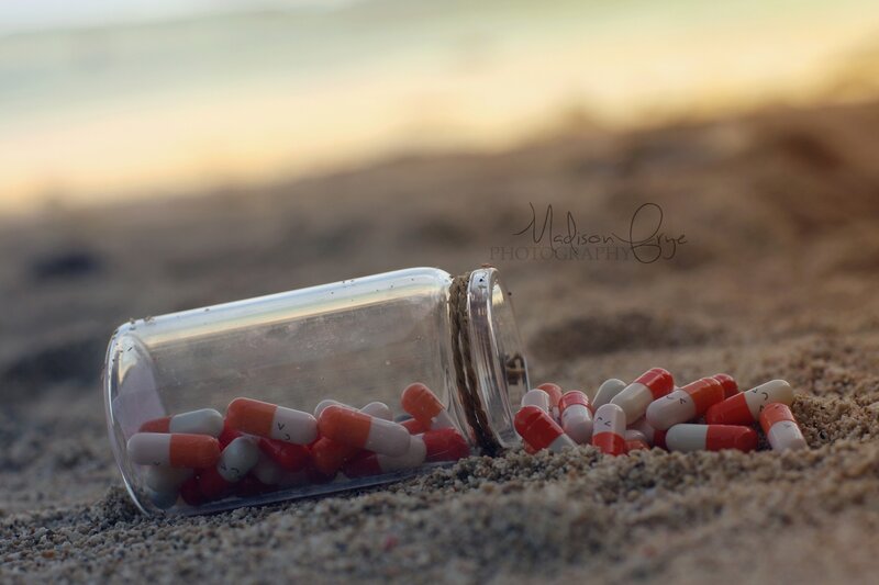 Capsules in Glass Bottle