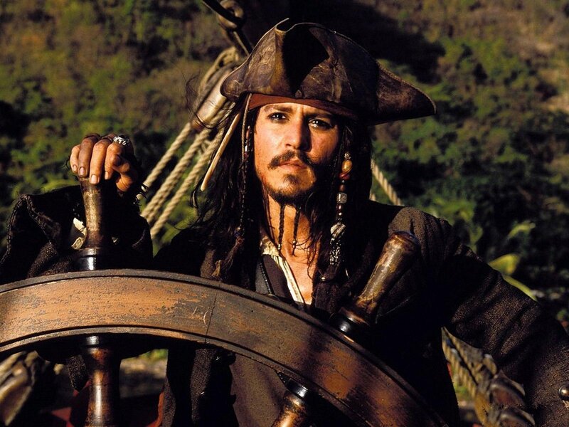 Captain Jack Sparrow at the helm