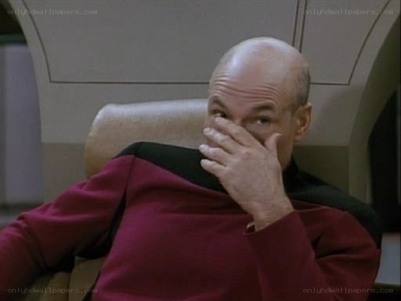 Captain Picard covering his face