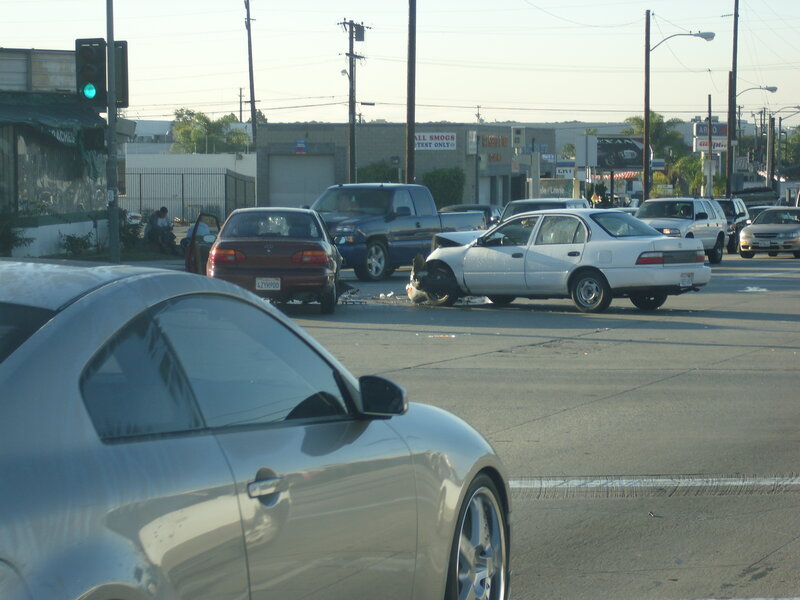Car Accident at Intersection — Gray