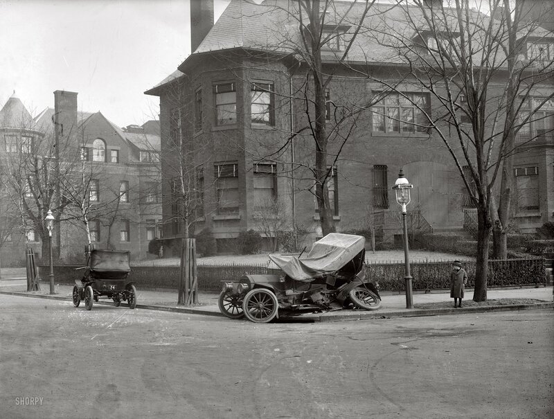 Car accident in early 1900s city