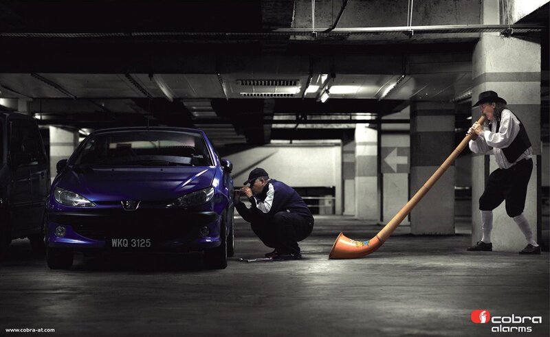 Car alarm advertisement in garage