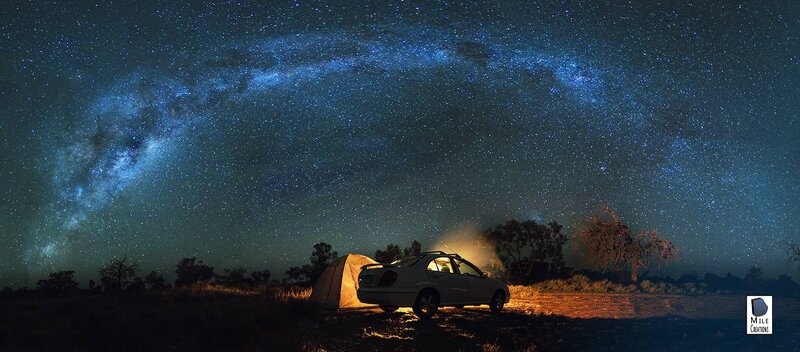 Car and Tent under Stars