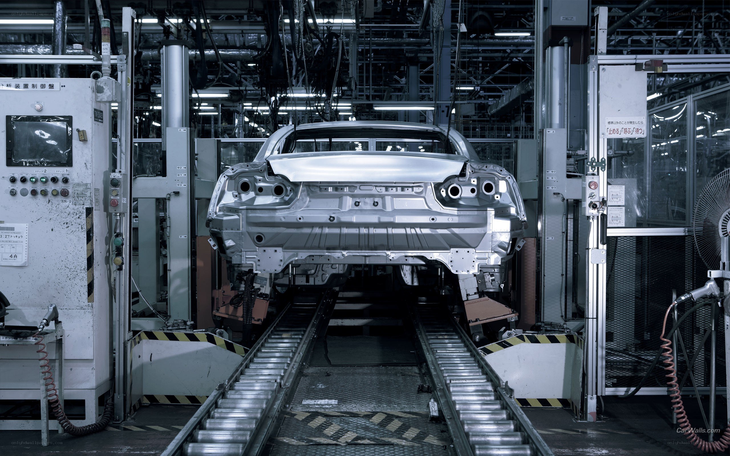 Car assembly line in factory