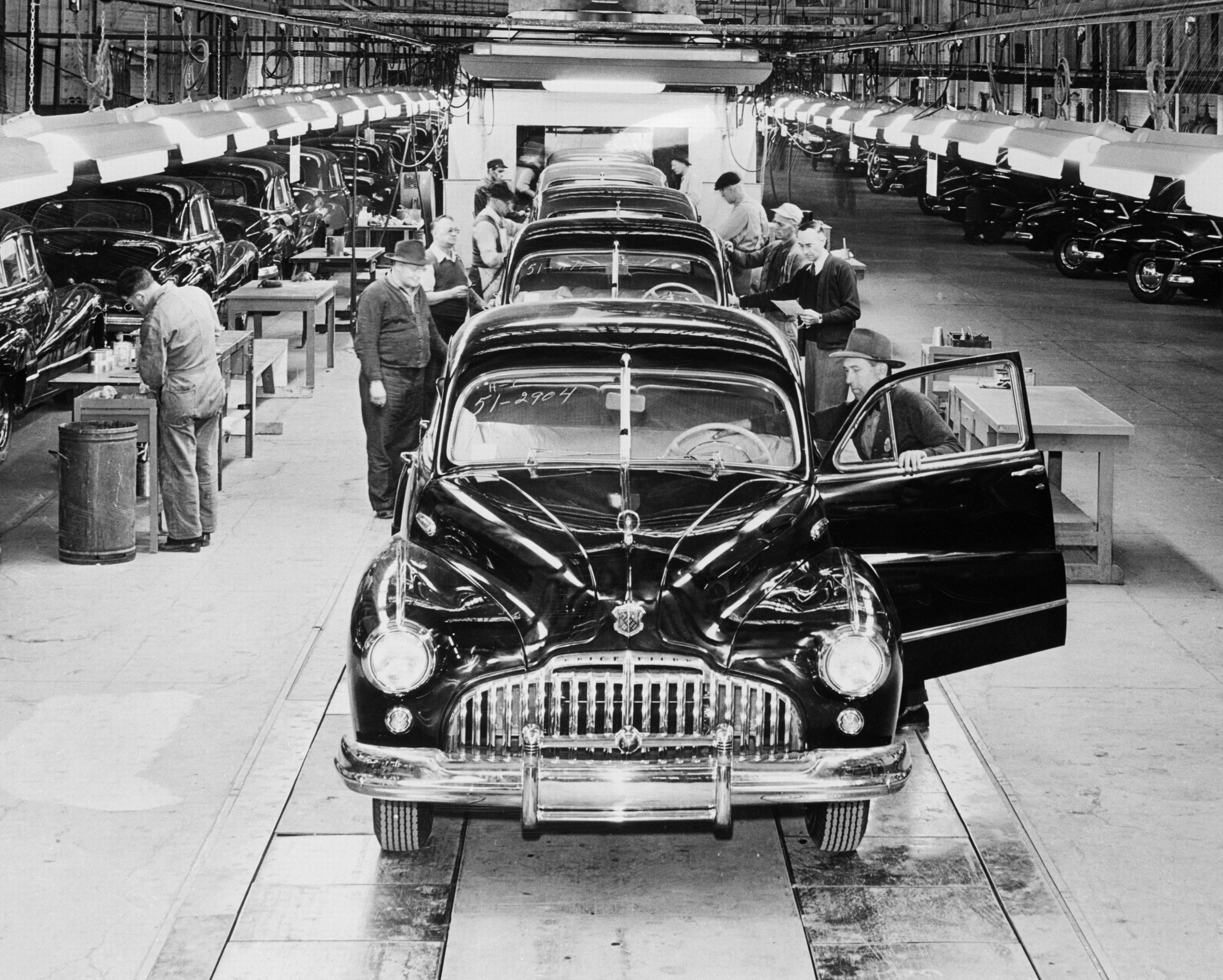 Car assembly line in factory