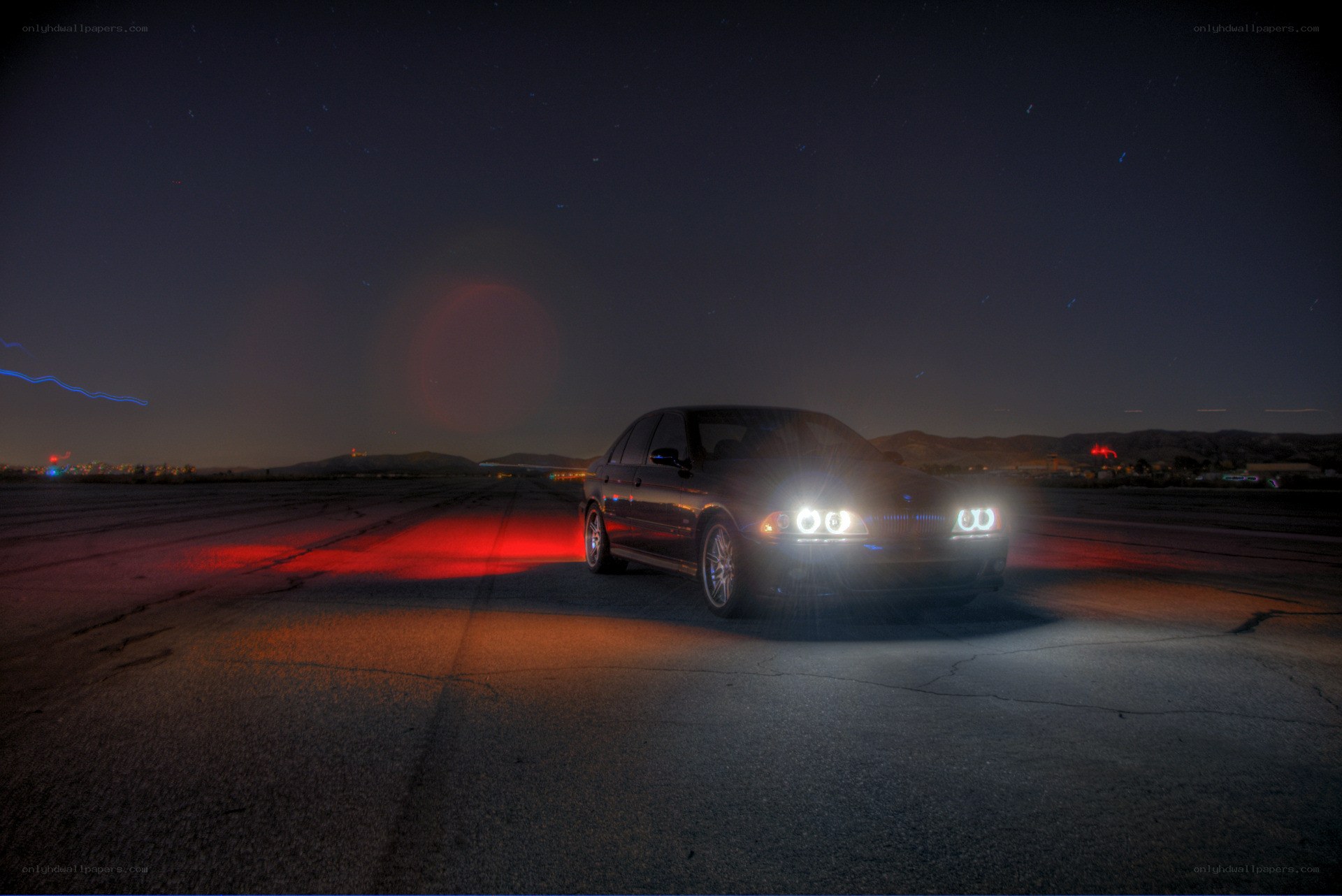 Car at night on a runway