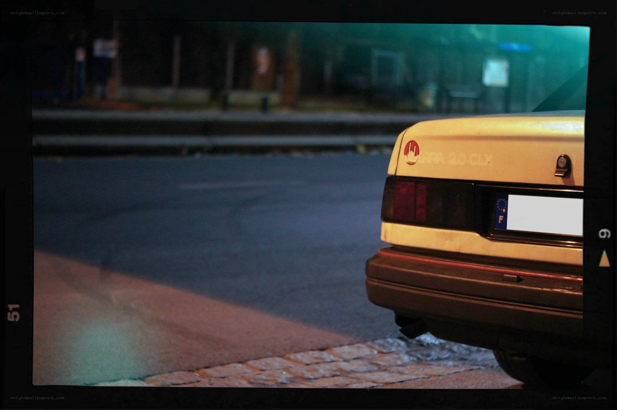 car at night on street