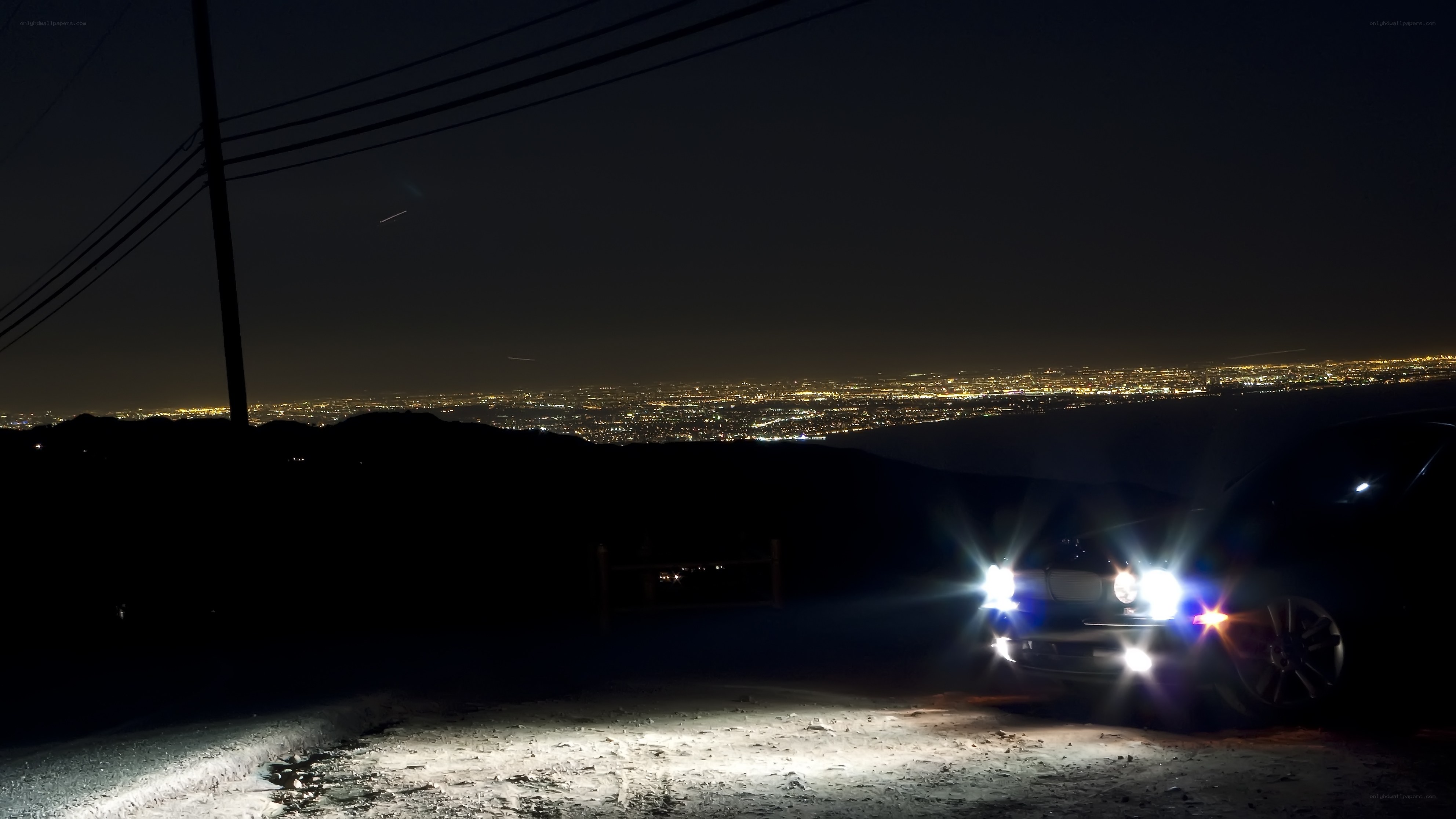 Car at night with city view