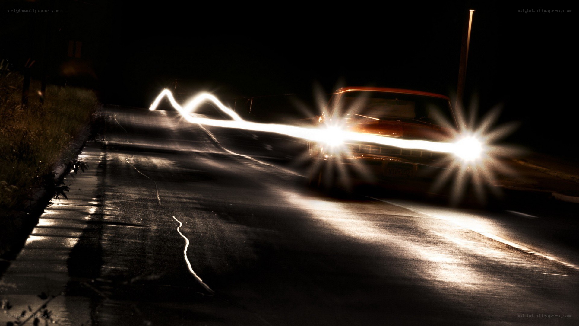 Car at night with light trails