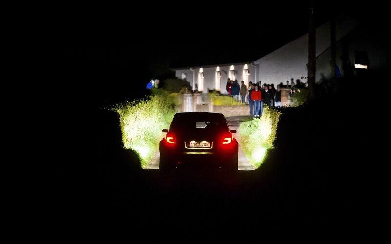 Car at Night with People
