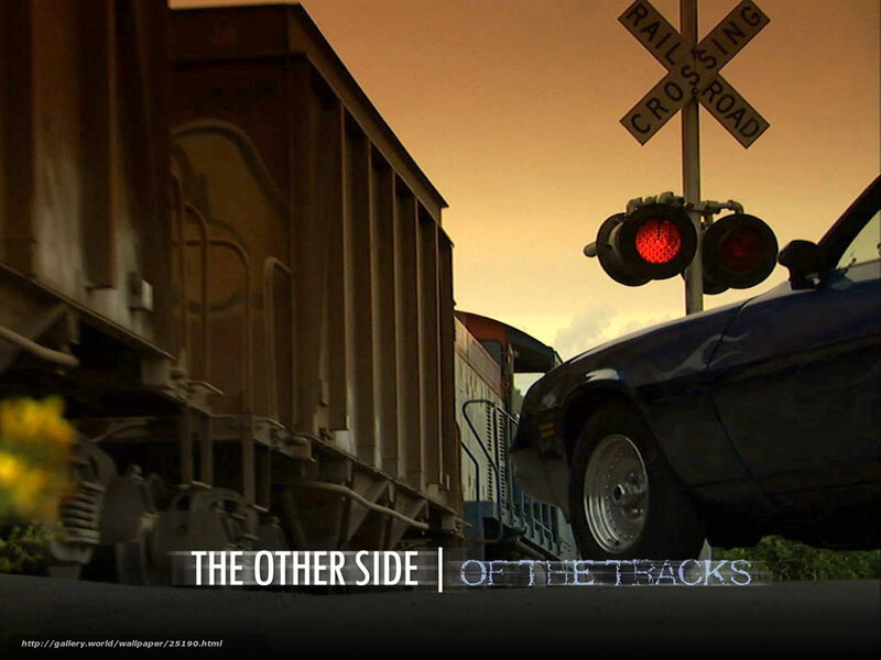 Car at Train Crossing